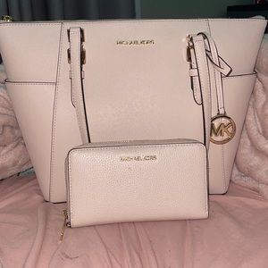 Light pink Michael kors purse and matching wallet